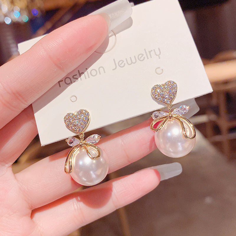 6 Pc - Heart big pearl earrings (Unit Price - 34)