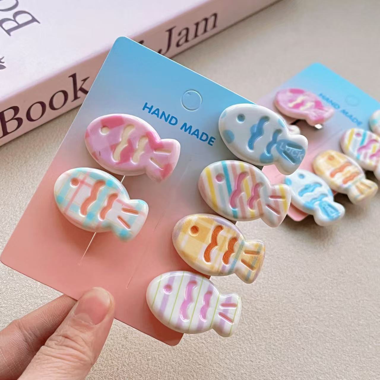 20 Pc - Girl's Cream Color Wave Cute Fish Hairpin opp packing (1 pc Price - 4)