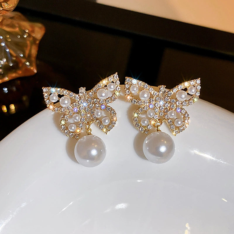 6 Set - Pearl butterfly earrings (1 Set price - 42)