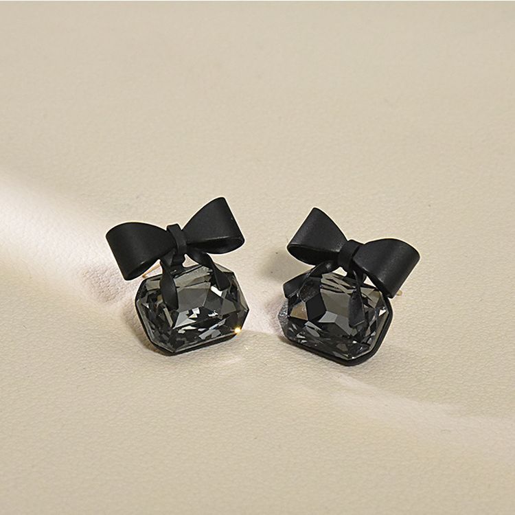 12pcs- Korean black bow crystal earrings (Unit Price -24)