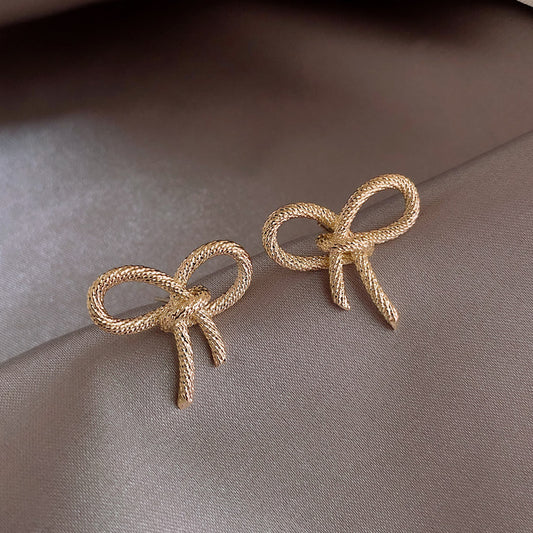 6 Set - Golden small bow earrings (Unit price 16)