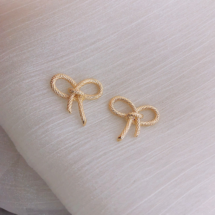 6 Set - Golden small bow earrings (Unit price 16)